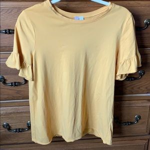 Yellow ruffled short sleeve shirt
